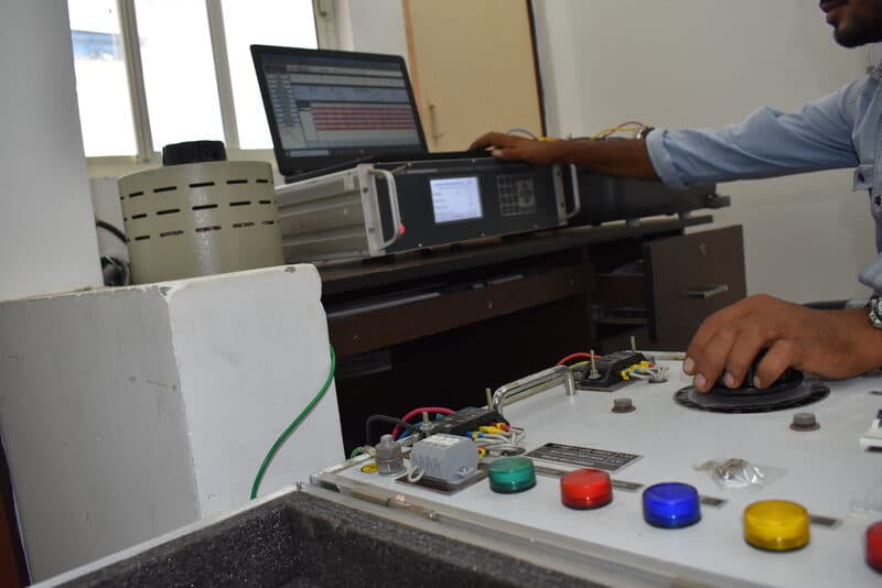 Automatic instrument transformer test set (AITTS Plus) with reporting software on laptop at SDES lab