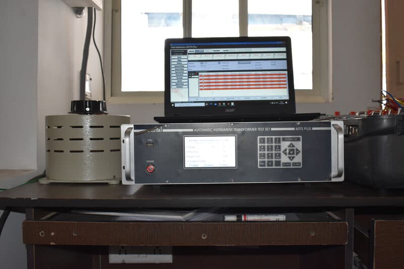 Three-phase energy meters mounted on test rig with MTE reference standard meters at SDES calibration lab